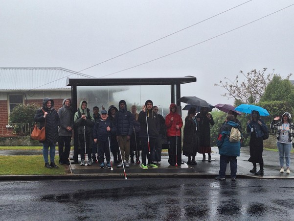 Figure 1 Akonga RTVs OM instructor and a parent waiting for the bus to arrive.