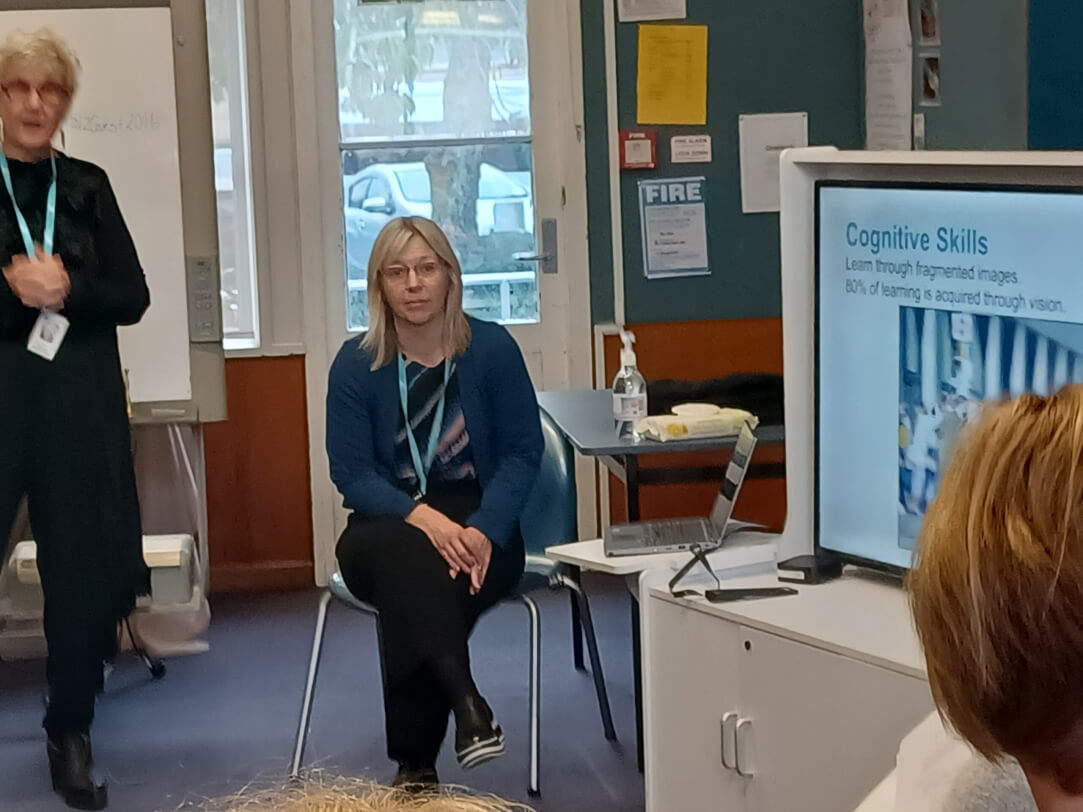 RTV is sitting and giving a presentation on exploring vision from the perspective of the visually impaired learner