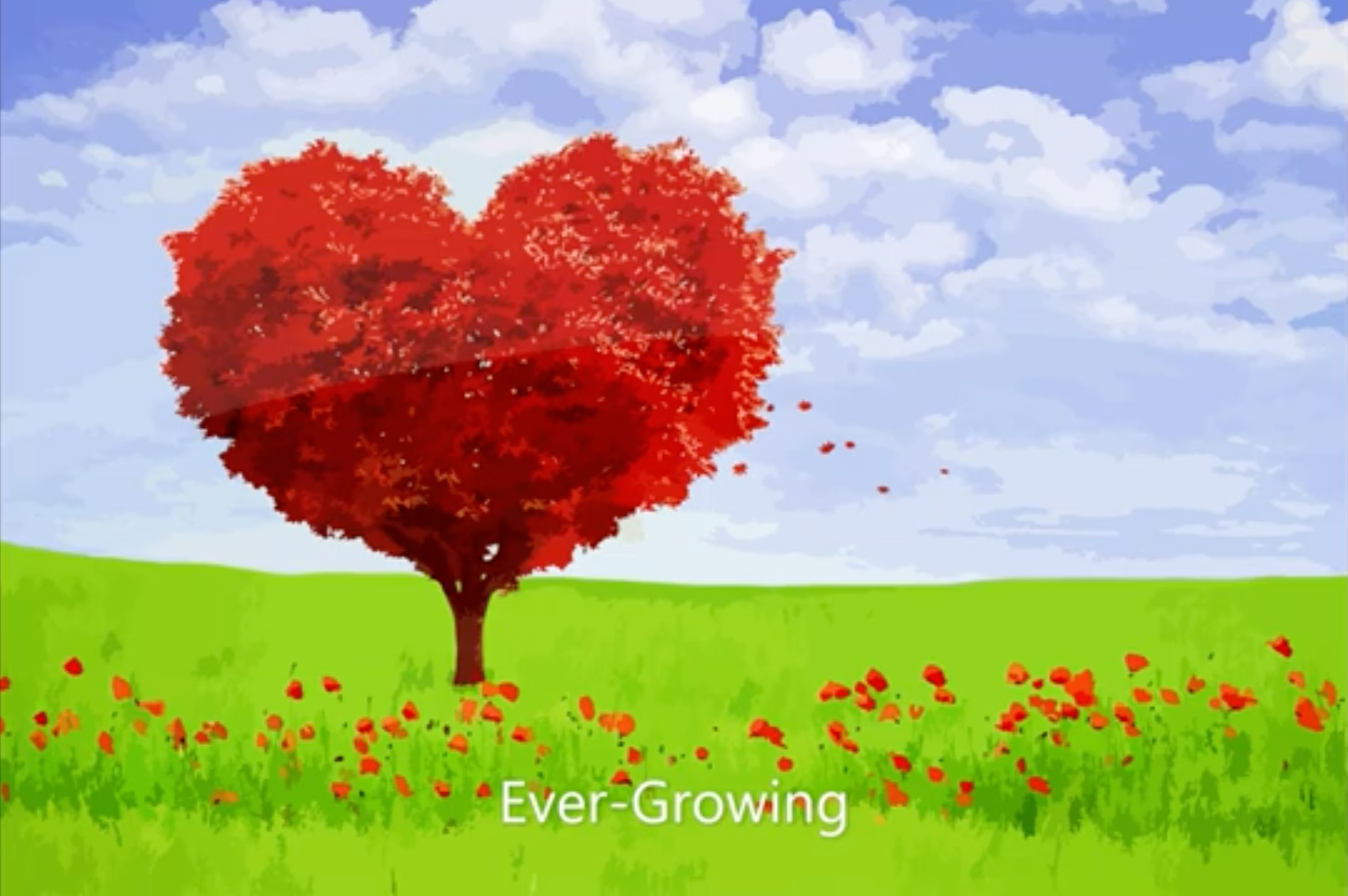Ever-growing video image – a tree with red leaves forming a heart shape